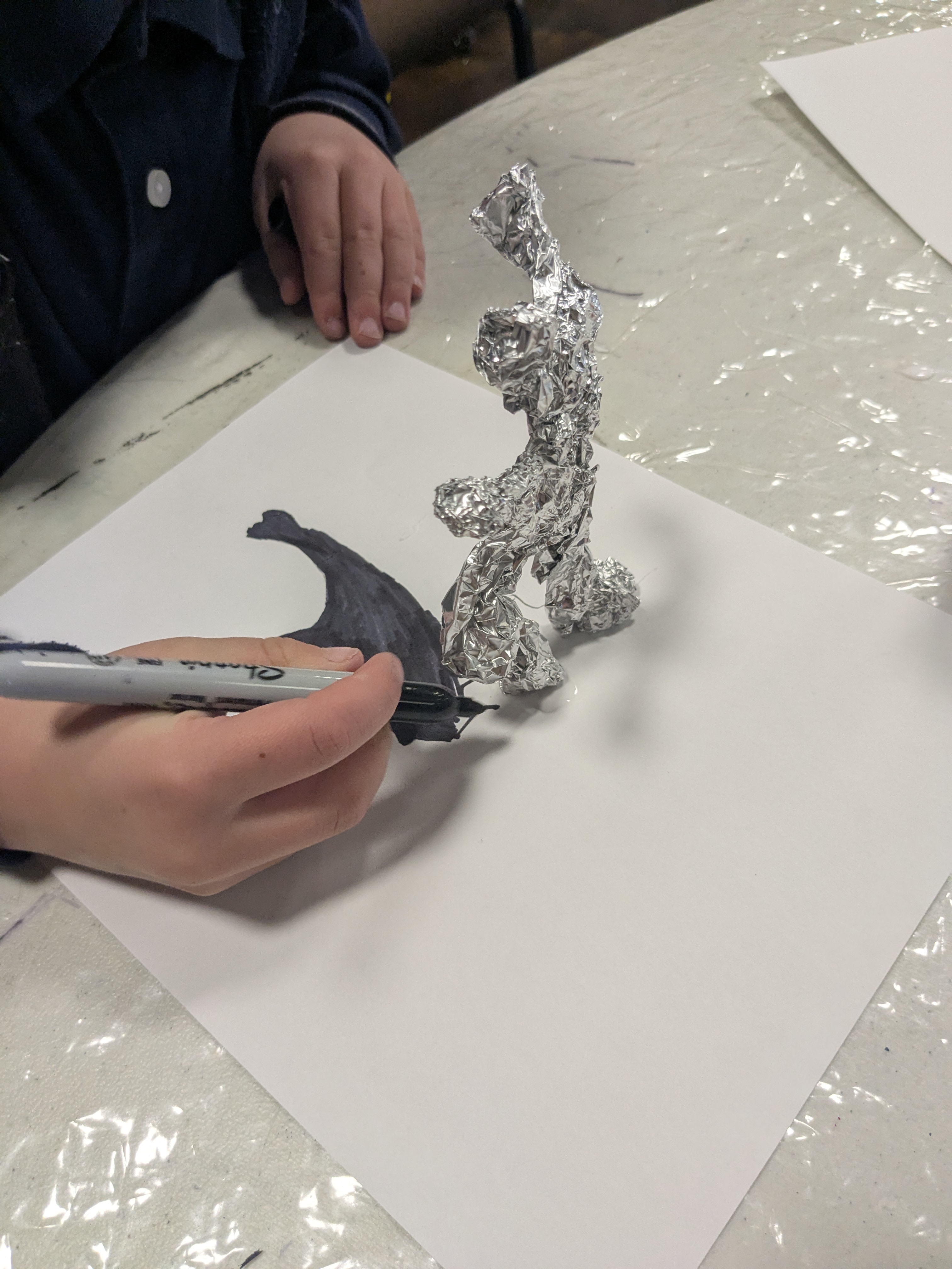 Foil sculpture with cast shadow
